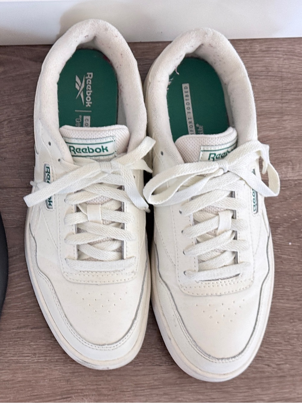 Reebok white cream sneakers with green accents